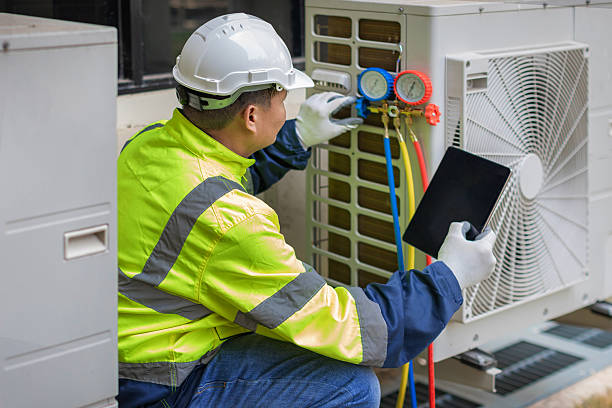 Professional Ac Installation technician working in Woodbine, GA